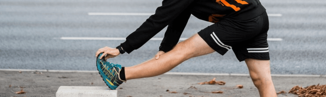 Athlete running in ArmaSkin socks demonstrating compression support and blister-free performance during high-impact activity.