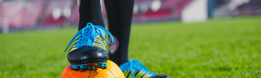 Athlete running in ArmaSkin compression socks with blister-prevention technology, showing secure fit and moisture management during activity